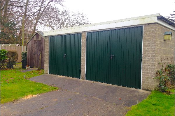 Side-hinged garage doors